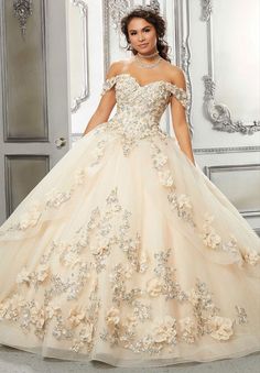 This off the shoulder Vizcaya ball gown dress 89318 is absolutely stunning. The three dimensional floral details combine with sequins and beads deck out the sweetheart neckline bodice. 15 Dresses Quinceanera White, Quinceanera Dresses Damas, Damas Dresses, Quince Dress, Champagne Dress, Princess Sleeves, Dresses Quinceanera, Baptism Dress, Quinceanera Dress