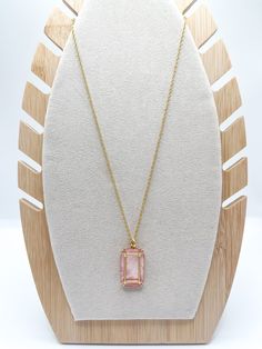 Our Orla Window Necklace features an intricately framed shimmering mother-of-pearl pendant on a lustrous 18kt matte gold plated chain. Simply beautiful with any outfit. A classic you will be pulling out of your jewelry case again and again. DETAILS Lobster closure Semi-Precious Mother-of-pearl, glass crystals 18kt matte gold plated Length: 18'' L with 2'' extension Chic Necklace With Rectangular Pendant For Gift, Chic Rectangular Pendant Necklaces For Gifts, Chic Rectangle Pendant Necklace For Gift, Feminine Gold Necklace For Formal Occasions, Elegant Pink Jewelry With Gold Chain, Gold Chain Necklace With Rectangular Pendant For Gift, Gold Square Pendant Necklace For Party, Gold-tone Necklace With Large Pendant As Gift, Gold Necklace With Detachable Square Pendant