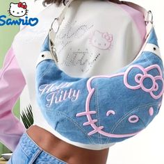 Sanrio Hello Kitty Denim Banana Shoulder Bag With Pink Embroidery And White, Pu Leather Strap. New In Package. Get Your Girlhood, Y2k Vibe Going With This Unique, Oldskool Hk Hobo Bag. Makes An Amazing Gift For Any Kitty Fan! Hello Kitty Bag, Denim Crossbody, Denim Handbags, Large Crossbody Bags, Denim Shoulder Bags, Hello Kitty Items, Wallet Organization, Crossbody Bag Women, Denim Bag