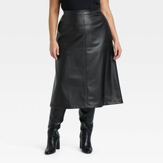 Add a modern touch to your wardrobe with this Faux-Leather Midi Skirt from A New Day™. Designed in black hue, this classic-rise midi skirt offers comfortable all-day wear. The side zipper makes it easy to take on and off, while the back slit finishes off the elegant look. A New Day™: Style that goes wherever you do. Midi Sweater Skirt, Leather Trend, Faux Leather Midi Skirt, Black Leather Skirt, Leather Midi Skirt, Fall Capsule Wardrobe, Black Leather Skirts, Slip Skirt, Denim Midi Skirt