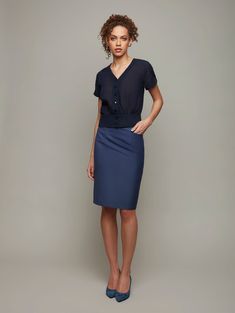 A fabulously fitting knee-length pencil skirt will become one of the most versatile hardest working pieces in your professional wardrobe.Satin side panels make it stand out for all the right reasons. It's fully lined to move gracefully with you and is exceptionally finished - a piece that's made to last.It's tricky to give styling advice for a skirt that goes everywhere and does almost everything. We'd suggest a classic shirt/tights/heels combination for work and a sleeveless top and bare legs for evening.Our Column skirt is cut from pure merino wool that drapes beautifully and moves with you. Satin side panels make it stand apart from the rest. It's fully lined and exceptionally finished. Shell100% WoolLining53% Rayon, 47% AcetateCareDry Clean Tights And Heels, Column Skirt, Knee Length Skirt Pencil, Professional Wardrobe, Work Blouse, Side Panels, Drop Waist, Skirts For Sale, Classic Shirt