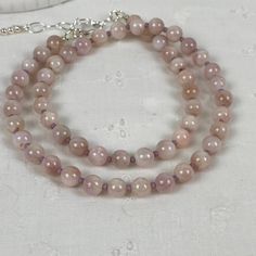 Pink Opal Single Strand Beaded Necklace As Gift, Delicate Pink Gemstone Bead Necklaces, Pink Delicate Necklace With Gemstone Beads, Delicate Pink Gemstone Beaded Necklaces, Delicate Pink Gemstone Beads Necklace, Pink Hand-strung Necklace As Gift, Pink Hand-strung Necklace For Gift, Pink Opal Round Beads Necklace For Gift, Dainty Pink Round Bead Crystal Necklaces