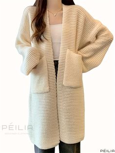 Peilia - Professional Open-Front Chunky Knit Cardigan: A Long-Sleeved, Mid-Length Sweater with Pockets for Womens Casual Attire Long Casual Knitted Sweater, Casual Long Knitted Sweater, Casual Long Sleeve Cream Sweater Coat, Casual Cream Long Sleeve Sweater Coat, Solid Color Open Front Winter Sweater, Long Beige Sweater For Winter, Cream Long Sleeve Sweater Coat With Pockets, Cream Sweater Coat With Pockets And Long Sleeves, Cream Sweater Coat With Pockets