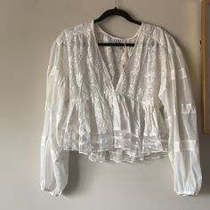 White Embroidered Crop Top Is Cute, Flirty, And Perfect For Spring. Boho Blouses White, Lace Tops With Floral Embroidery For Brunch, White Lace Vest, Tv Nook, Red Sleeveless Blouse, Cute Flirty, Blue Striped Blouse, Overlay Blouse, Pink Floral Blouse