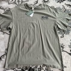 Nwt Never Worn! Khaki Green Color H&m Cotton Tops For Streetwear, H&m Graphic Tee Tops For Spring, H&m Cotton T-shirt Relaxed Fit, H&m Spring Graphic Tee Tops, H&m Cotton Relaxed Fit T-shirt, H&m Relaxed Fit Cotton T-shirt, H&m Cotton T-shirt With Relaxed Fit, H&m Cotton Tops With Relaxed Fit, H&m Cotton Streetwear T-shirt