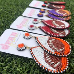 Show your love for the game when accessorizing your Game Day look with these dual colored uniquely beaded football earrings!   The perfect accessory to coordinate with your Friday Night Lights ensemble or Saturday tailgate style. Football Earrings, Glam Jewelry, Sports Jewelry, Nickel Free Jewelry, Earring Collection, Ball Earrings, Friday Night Lights, Earrings Collection, Night Lights