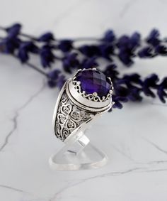 Amethyst Silver Floral Boho Statement Ring 925 Sterling Artisan Made Handcrafted Filigree Genuine Gemstone Cocktail Ring Women Jewelry, Handmade rings jewelry Material: 925 Sterling Silver ( NICKEL FREE ) Gemstone: Amethyst 12 mm. FREE, FAST AND TRACKABLE SHIPPING FOR ALL EU COUNTRIES AND USA. -That ring is so stunning and dainty. Perfect for everyday wear. There is a gorgeous small Flower on the band of the ring and a Amethyst Gemstone that dainty. This purple stone ring is made from our finest silver so they are durable for your everyday wear. COMES WİTH VELVET POUCH AND LUXURY GİFT BOX. Makes a great gift: Beautiful jewelry to give for every occasion. The perfect present  for mom , sister, daughter , granddaughter , grandmother , wife , girlfriend , best friend or any special in your li Purple Oval Filigree Ring As A Gift, Purple Rings With Intricate Design For Gift, Oval Purple Filigree Ring As Gift, Purple Oval Filigree Ring For Gift, Amethyst Ring With Intricate Design For Gift, Amethyst Ring With Intricate Design As Gift, Ornate Amethyst Ring As A Gift, Engraved Purple Amethyst Ring Gift, Silver Amethyst Ring With Intricate Design For Gift