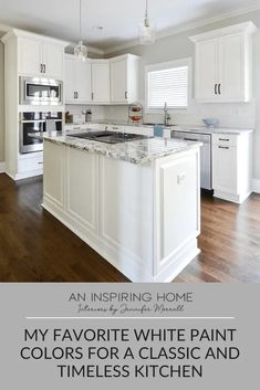 a white kitchen with wood floors and cabinets in the background is an inspiring home