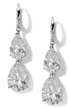 A pair of pear-shaped cubic zirconia creates an elegant aesthetic for these hand-polished earrings set in gleaming 18-karat gold plate. 1 5/8" drop; 3/8" width 18k-gold plate/cubic zirconia Imported Elegant Teardrop Diamond Earrings Fine Jewelry, Teardrop Diamond Earrings With Elegant Design, Formal Pear-shaped Earrings With Diamond Accents, Formal Pear Shaped Earrings With Diamond Accents, Formal Pear-shaped Teardrop Earrings In White Gold, Formal White Gold Pear-shaped Teardrop Earrings, Pear-shaped Cubic Zirconia Diamond Earrings In White Gold, Pear-shaped Cubic Zirconia Diamond Earrings, Teardrop Diamond Cut Bridal Earrings