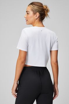 Dry-Flex Cropped Short-Sleeve Tee Fabletics white female Activewear >> Womens >> Tops >> Short Sleeve T-Shirts >> Cropped regular Everyday/Training/Yoga and Studio Moisture-Wicking Made from recycled fabric! White Sporty Cropped T-shirt For Workout, Female Tshirt, Female Activewear, Crossover Leggings, Cropped Tee, Eco Fashion, Crop Tshirt, Photo Colour, Model Photos