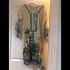 Pakistani Dress Brand New Size Large Stuff Lawn Measurements Bust Size 21 Shirt Length 37 Trouser Length 37to38 Elegant Blue Floral Print Kurta, Elegant Cream Kurta For Summer, Fitted Cream Kurta For Summer, Fitted Cream Kurta For Spring, Elegant Beige Kurta For Spring, Fitted Beige Kurta For Spring, Blue V-neck Kurta For Spring, Elegant Beige Kurta For Summer, Dresses Pakistani