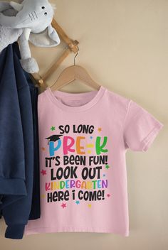 Welcome to my shop: MaryCrafterDesign! From Pre-K to Kindergarten - A Journey of Learning and Fun!?🎓🎉 Celebrate your child's transition from Pre-K to Kindergarten with this fun and colorful print! Perfect for your little one or as a gift for their teacher.   * High quality and super soft, comfortable shirt. Made with top-of-the-line DTF and pressed with a professional grade heat press. * Please check all color and size charts before place the order. Since all shirts are custom made based on yo Pink Cotton Top For Back To School, Long Sleeve Cotton Top For School Events, Cotton Long Sleeve Tops For School Events, Long Sleeve Cotton Tops For School, Short Sleeve T-shirt With Letter Print For School Events, Pink Short Sleeve Tops For School Events, Casual Short Sleeve Shirt For School Events, Pink Text Print Top For School, Pink Text Print Shirt For School