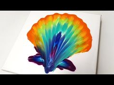 a book with an image of a colorful fish on it