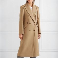 Discover Timeless Elegance Introducing our latest addition, the Chic Slimming Trench Coat for Women - a perfect blend of classic style and modern flair. This double-breasted coat is a must-have in your autumn/winter wardrobe, offering both warmth and a touch of sophistication. Its well-structured design and premium fabric composition make it a standout piece. Product Features Material: A luxurious mix of Wool, Cotton, and Polyester, ensuring durability and comfort. Design: Double-breasted closure with a notched collar, creating a polished and professional look. Fit: Wide-waisted style, tailored to accentuate your figure while providing ease of movement. Collar: Elegant turn-down collar adds a chic element to the overall design. Sleeve: Regular full-length sleeves, perfect for layering in c Beige Gabardine Pea Coat For Winter, Winter Beige Gabardine Pea Coat, Winter Gabardine Blazer With Hidden Button Closure, Elegant Gabardine Outerwear With Pockets, Winter Fitted Gabardine Pea Coat, Notch Lapel Double-breasted Outerwear For Fall, Fall Outerwear With Double-breasted Button And Notch Lapel, Chic Fitted Gabardine Pea Coat, Gabardine Blazer For Winter