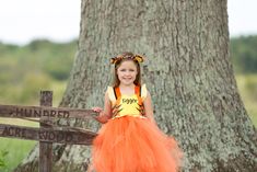 How cute is this Tigger dress!! Oh so cute!!! Perfect for Halloween,dress up, birthdays,and special events! This dress is made knee length,you dont have to leave a measurement,but if you choose to please leave a measurement from armpit to desired length. Checkout our shop for our Winnie the Pooh,and Piglet Design!!! Ears are NOT included but can be added on from the drop down menu.(Ears may vary in style depending on stock) Exclusive Design to Pink Toes & Hair Bows Cute Halloween Dress-up Costumes, Themed Dresses For Halloween Events, Themed Halloween Dresses, Themed Dress-up Dresses For Halloween, Themed Halloween Dress-up Dresses, Cute Halloween Costumes For Dress-up, Cute Spring Tutu Dress For Costume Party, Cute Tutu Dress For Halloween Costume, Fun Halloween Costume Dress