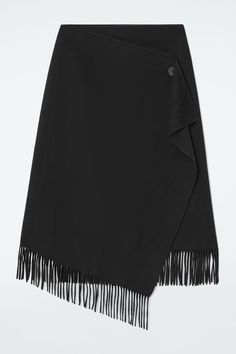 Tapping into this season's fringing trend, this wrap-front midi skirt has tassels at the hem that create movement as you walk. Offered in a midnight-navy hue, it's crafted from double-faced, RWS-certified wool that's blended with TENCEL™ Lyocell for an elegant drape. Style it with a sweater and knee-high boots. Relaxed fitButton closureCertified according to the Responsible Wool Standard, to protect the welfare of the sheep and their environment  60% RWS Wool, 40% TENCEL™ Lyocell / Dry clean Back length of size 6 is 30.15" / Model wears a size 6 Black Leather Wrap Skirt, Belted Cape, Hem Leggings, Trench Coat Dress, Midi Wrap Skirt, Land Management, Jersey Skirt, Denim T Shirt, Winter Skirt