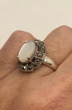 Vintage hand made mother of pearl set in 925 sterling silver ring I have size 8 Can be re sized for you, my jeweler charges a $10-$20 fee All rings are shipped free in the US in a nice gift box. Check out our over a THOUSAND great reviews Engraving is $4 per letter and is not always perfect depending on the piece. It can take a few days if the jeweler is busy. This is payable to Paypal Judithsltd@gmail.com Classic Mother Of Pearl Rings As A Gift, Classic Mother Of Pearl Rings As Gift, Classic Mother Of Pearl Round Rings, Classic Mother Of Pearl Rings, Classic Mother Of Pearl Ring As A Gift, Classic Mother Of Pearl Ring As Gift, Gift Rings With Polished Mother Of Pearl Finish, Classic Mother Of Pearl Ring For Gift, Classic White Opal Ring For Gift