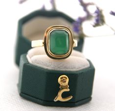 Elegant Domed Emerald Ring, Green Art Deco Jewelry With Bezel Setting, Elegant Domed Emerald Ring Gift, Art Deco Green Jewelry With Bezel Setting, Green Bezel Set Signet Ring For Wedding, Art Deco Green Ring With Bezel Setting, Green Signet Ring With Bezel Setting For Wedding, Green Signet Ring With Bezel Setting For Gift, Elegant Green Domed Jewelry