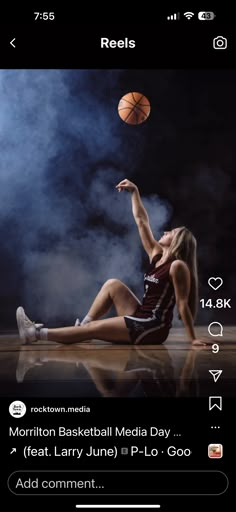 a woman sitting on the floor with a basketball in her hand and texting below