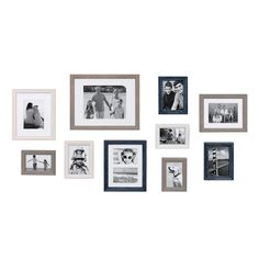 a group of white framed pictures hanging on the wall