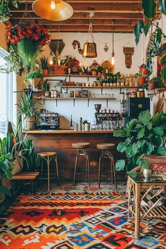 a room filled with lots of plants and furniture