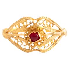 18K yellow gold ring centered with a cabochon-cut red stone. Antique. Numbered. Gross weight: 2.19 grams. Gold Rings Indian, Gold Antique Ring, Rings Indian, Antique Gold Rings, Antique Ring, 18k Yellow Gold Ring, Red Stone, Yellow Gold Ring, Antique Rings