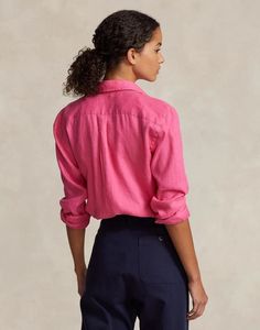 Introducing our 100% Linen Shirt, the ultimate blend of comfort, style, and versatility. Crafted with a classic neckline, long sleeves, and buttoned cuffs, this solid color shirt is a timeless addition to your wardrobe. Whether you're dressing it up for a night out or keeping it casual for a day at the office, the breathable and lightweight linen fabric will keep you feeling cool and comfortable all day long. The button closing adds a touch of sophistication, while the brand logo subtly showcase Solid Color Long Sleeve Shirt With Rolled Sleeves, Spring Shirt With Rolled Long Sleeves, Long Sleeve Shirt With Rolled Sleeves For Spring, Classic Long Sleeve Tops With Roll-up Sleeves, Linen Long Sleeve Shirt With Roll-up Sleeves, Linen Shirt With Roll-up Long Sleeves, Long Sleeve Linen Shirt With Roll-up Sleeves, Casual Long Sleeve Shirt With Rolled Sleeves, Long Sleeve Shirt With Placket For Spring