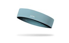 a blue headband with the word jux written on it