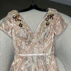 Stunning Pink And Gold W Floral Appliqu Size 4 Nwt , Never Worn Purchased Directly From Vendor (Online) Saks Carries This Designer Pink V-neck Cocktail Evening Dress, Floral Embellished V-neck Evening Dress, Pink Silk V-neck Evening Dress, Pink Floral Embellished Evening Dress, Pink V-neck Sequin Evening Dress, Pink Floral Evening Dress, Luxury Floral Embellished Fitted Dresses, Pink Short-sleeved Evening Dress For Wedding, Pink Short Sleeve Evening Dress For Wedding