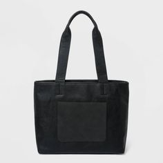 Whether headed to office or running errands during off-duty days, this Large Tote Handbag from Universal Thread™ will carry your essentials in style. This tote handbag in chic, classic black features a large shape that provides plenty of room to keep your keys, phone, wallet and other small essentials close at hand and neatly organized. The double handle makes for easy and comfy carrying, while multiple interior and exterior pockets let your store your stuff the way you want. Versatile and simpl Fanny Pack Purse, Uniqlo Bags, Pink Crossbody Bag, Best Purses, Pink Tote Bags, Brown Leather Totes, Brown Tote, Woven Tote Bag, Straw Tote