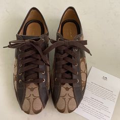 Nib Coach Khaki/Chestnut Leather Sneakers- Worn Once. Excellent Condition! Vintage Brown Sneakers With Cushioned Footbed, Retro Round Toe Sneakers For Fall, Brown Round Toe Sneakers With Laces, Brown Sneakers With Laces And Round Toe, Brown Lace-up Sneakers With Round Toe, Retro Brown Low-top Sneakers, Vintage Leather Sneakers For Fall, Vintage Lace-up Sneakers For Fall, Retro Brown High-top Sneakers