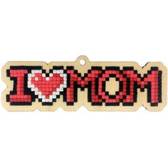 the word i love mom spelled in pixelated letters with a heart on it's side