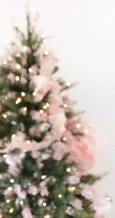 a christmas tree with pink and white ornaments