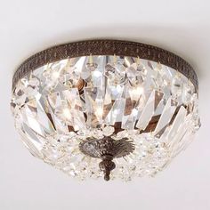 a close up of a light fixture on a ceiling