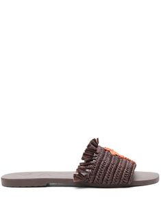 chocolate brown/orange almond open toe braided raffia toe strap with palm tree motif fringe detailing branded insole flat rubber sole slip-on style Casual Brown Sandals With Tassels, Brown Woven Straw Sandals, Brown Flat Slides For Vacation, Brown Straw Slip-on Sandals, Brown Beach Slides With Woven Sole, Beach Slides With Woven Sole In Brown, Brown Braided Strap Sandals For Beach, Brown Slip-on Slides For Vacation, Brown Summer Slides For Beach