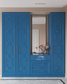 a blue armoire in the middle of a room