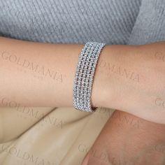 All Our Bracelets Are Made Of REAL 14K GOLD  14K White Gold Large Multi Row Sparkly Bracelet, 14 mm Thick, 7" Inch, Statement Bracelet, Red Carpet Bracelet, Real Gold Bracelet, Women  Shop our 14K Bracelets https://www.etsy.com/shop/GOLDMANIA?ref=seller-platform-mcnav§ion_id=26925987  Shop On Sale items https://www.etsy.com/shop/GOLDMANIA?ref=seller-platform-mcnav§ion_id=1  Metal: 14K White Gold, 14K Two Tone Gold Width: 14 mm   Length: 7" Closure: Slide clasp  Weight: 23.80 Gram  SHIPPED FROM N Luxury Polished Gold-colored Sterling Silver Bracelet, Luxury White Gold Chain Bracelet, Tarnish Resistant, Gold-tone Stainless Steel Bracelets With Jubilee Bracelet, Gold Cubic Zirconia Multi-stone Bracelets, Gold-tone Cubic Zirconia Bracelet, Real Gold Bracelet, Sparkly Bracelets, Gold Link Chain, Christmas Gift Jewelry