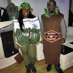 two people dressed in costumes standing next to each other