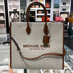 Michael Kors Mirella Large Signature Mk Tote Bag (Vanilla Mk) 35f2g7zt3b New With The Tag Authentic 100 % Polyester Imported Polyester Lining Open Closure Gold-Tone Hardware 15.75”W X 14”H X 7.75”D Handle Drop: 5.25” Adjustable Strap: 20.5”-24.25” Interior Details: Back Zip Pocket, 2 Front Slip Pockets Lining: 100% Polyester Details Tote Bag Logo Pvc Leather Gold-Tone Hardware 15.75”W X 14”H X 7.75”D Handle Drop: 5.25” Adjustable Strap: 20.5”-24.25” Interior Details: Back Zip Pocket, 2 Front Sli Mk Tote Bag, Bag Logo, Bags Logo, Handbags Michael Kors, Bago, Michael Kors Bag, Interior Details, Womens Tote Bags, Zip Pockets