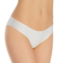 An ethereally light panty that is sure to become an everyday favorite. Made of nylon/cotton/elastane. Waist edge and leg openings have absolutely nothing sewn on to show under clothes. Silky microfiber knit feels heavenly soft against your skin. Sides are bonded. Four-way stretch moves any way you do. Low rise. Cheeky, seamless rear coverage. Tagless to help prevent irritation. Fully lined with bonded cotton crotch. Simone Perele Women's Uniq Bikini Panty in Ivory (10V720) | Size XL | HerRoom.co White Fitted Partially Lined Bottoms, Fitted Partially Lined White Bottoms, White Fitted Bottoms Partially Lined, Fitted White Bottoms Partially Lined, White Partially Lined Briefs, White Seamless High-cut Leg Bottoms, White Seamless Bottoms With High-cut Leg, Elegant White Bottoms With Soft Touch, Seamless Cream Brief Bottoms