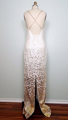 "This is an absolutely breathtaking gown. It's fully embellished with bright white and gold sequins and accented with tiny gold beading between each and every sequin. The straps are also embellished with gold glass beading. It's in excellent condition! Measurements: Bust - 32-36\" Waist - 26-30\" Hips - 36-40\" Total Length - 61\" This dress comes from a pet-free and smoke-free home. If you would like more info or have any questions, please don't hesitate to ask!" Gold Sequined Evening Gown, Gold Sequin Gown For Evening, White Sequined Evening Dress For Gala, Wedding Sequin Dress With Contrast Sequin In Maxi Length, Gold Sequined Gown For Prom, Gold Embellished Gown For Party Season, Glamorous White Sequin Dress For Gala, Gold Embellished Gown For Prom Season, Gold Sequin Dress For Wedding And Prom Season