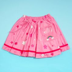 Complete your Harajuku look by wearing this cute skirt! It showcases a print of Love-a-Lot from Care Bears and is decorated with stars and rainbows. This skirt even features a matching chain and a pocket that's perfect for your smartphone! Waist size: Can stretch from 62 cm to 100 cm Skirt length: Approx. 44 cm Made of polyester Acdc Rag, Kawaii Backpack, Pink Friday, Best Candy, Cute Skirt, Stationery Accessories, Skirt Socks, Care Bears, Cute Skirts