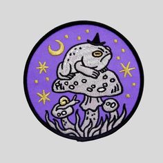 a patch with a dog sitting on top of a mushroom