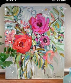 a painting with flowers painted on it