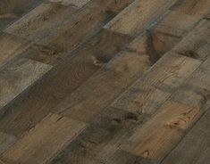 wood flooring that looks like it has been made from different types of planks