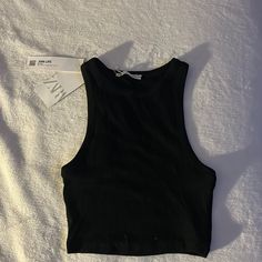 Nwt Zara Basic Black Crop Tank Size Small New W Tags Black Basic Tank Top For Summer, Basic Black Summer Tank Top, Basic Black Tank Top For Summer, Basic Black Tank Top For Spring, Basic Black Spring Tank Top, Zara Basic Stretch Crop Top, Zara Black Stretch Crop Top, Zara Sleeveless Black Crop Top, Fitted Black Zara Tank Top