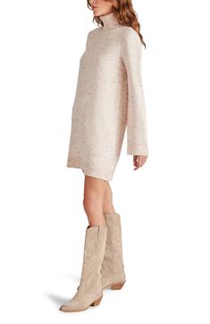 The Abbie turtle neck sweater dress is rendered in a cozy knit-blend for a wardrobe essential that can be dressed up or down. 33 2/3" length (size Small) Turtle neck collar Long sleeves 55% acrylic, 26% polyester, 19% nylon Hand wash, dry flat Imported Knee-length Knit Sweater Dress For Loungewear, Knit Sweater Dress For Loungewear, Beige Turtleneck Dress For Winter, Winter Beige Turtleneck Dress, Beige Turtleneck Winter Dress, Fall Cable Knit Knee-length Sweater Dress, Winter Knee-length Sweater Dress For Loungewear, Knitted Knee-length Sweater Dress For Fall, Beige Mini Sweater Dress For Winter