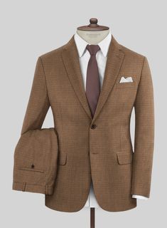 Enhance the organization of your closet by adding our exquisite Italian Murano Karilo Brown Wool Linen Silk Suit. Meticulously crafted from a blend of premium-quality wool, linen, and silk, known for their exceptionally soft and supple texture. The suit features a handsome brown shade accentuated by a sophisticated micro-check pattern, adding a touch of elegance to your formal attire. With this opulent suit, you will effortlessly exude refined style on any formal occasion.  Look features a 2 but Brown Formal Suits In Suiting Fabric, Luxury Brown Suits In Suiting Fabric, Brown Wool Suit With Button Closure, Brown Semi-formal Tuxedo In Suiting Fabric, Brown Wool Single-breasted Suits, Brown Shade, Silk Suit, Brown Shades, Formal Outfits