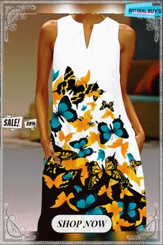 a woman is walking down the runway wearing a dress with butterflies on it and an advertisement for