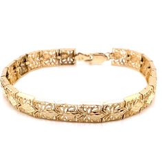 Vintage 14k yellow gold filigree link bracelet. The bracelet is 7" long and almost 8mm wide and features a lobster clasp. The bracelet weighs 14.03 grams of gold. Classic Gold Bracelet With Intricate Design, Formal Yellow Gold Bracelet With Intricate Design, Luxury 14k Gold Bracelet With Intricate Design, Intricate Design Gold Bracelet For Formal Occasions, Elegant 14k Gold Bracelets With Decorative Band, Elegant Yellow Gold Bracelets With Decorative Band, Elegant Yellow Gold Bracelet With Decorative Band, Ornate Yellow Gold Bracelets For Formal Occasions, Ornate Yellow Gold Bracelet For Formal Occasions